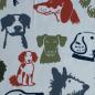 Preview: Baumwolljersey Hundeköpfe grün blau rostorange auf weiß